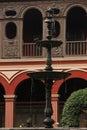 A fountain decorates an inner garden