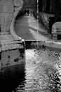 Fountain detail with a little water falling, black and white Royalty Free Stock Photo