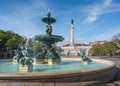 Fountain and Dom Pedro IV Monument at Rossio Square - Lisbon, Portugal Royalty Free Stock Photo