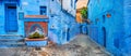 Fountain with drinking water on house coloured wall in blue town Chefchaouen. Morocco, North Africa