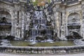 Fountain with faunus statues and streaming water at Zwinger palace Royalty Free Stock Photo