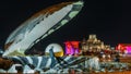 A fountain featuring an oyster with a gigantic pearl inside night timelapse with the Doha skyline behind it Royalty Free Stock Photo