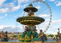 Fountain and ferris wheel in Paris Royalty Free Stock Photo