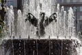 The fountain in the form of a bowl adorns the city square, which is an element of the urban landscape