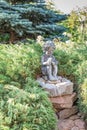 Fountain in the form of a sculpture of a boy with turtle. Royalty Free Stock Photo