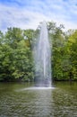 Fountain in the form of a snake in the water Royalty Free Stock Photo