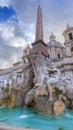 Urban view of Rome, Italy: Fountain of the Four Rivers Fontana dei Quattro Fiumi with an Egyptian obelisk in Navon Square Piazz Royalty Free Stock Photo