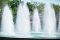 Fountain with fresh cool water, splashes of water on a natural background, summer nature, refreshing moisture. Royalty Free Stock Photo