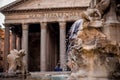 Fountain in front of the Pantheon in Rome on background. Royalty Free Stock Photo