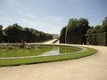 Fountain with garden on the background Royalty Free Stock Photo