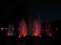 Fountain in garden colorful water lighting night scene Royalty Free Stock Photo
