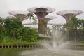 Fountain in Gardens by Marina and Singapore flyer Royalty Free Stock Photo