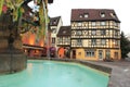 Fountain and half-timbered house in Colmar