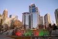 The fountain has holiday colors of red and green Royalty Free Stock Photo