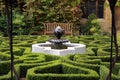 Fountain. hedge boxes. garden. park.