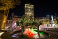 Fountain and highrise building at night, at Penn Square, in down