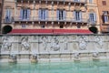 Fountain of joy - a medieval marble fountain in Siena. Panel Fonte Gaia, Piazza del Campo, Siena, Tuscany Royalty Free Stock Photo