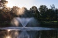 Fountain on Lake at Sunrise