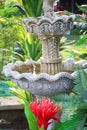 Fountain made of beautiful in a vintage style in the garden. Beautiful garden decoration