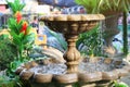 fountain made of beautiful in a vintage style in the garden. Beautiful garden decoration