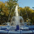 Fountain made of blue marble with water splashing around