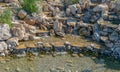 Fountain made of stones. Natural waterfall Royalty Free Stock Photo