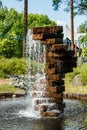 Fountain made of stones in the summer park Royalty Free Stock Photo