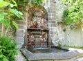 The fountain with the mascaron in Royat Royalty Free Stock Photo