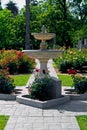 Fountain in the middle of rose garden