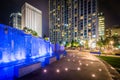 Fountain and modern buildings at night, seen at Romare Bearden P Royalty Free Stock Photo