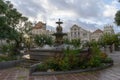 Fountain of the muses in Huesca in a park on a cloudy day in Spain