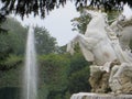 Fountain next to a statue in Schonbrunner Schloss Park in Vienna, Austria