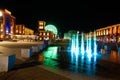Fountain and old factory, known as the commercial center Manufaktura at night. Lodz, Poland Royalty Free Stock Photo