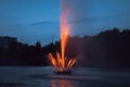 Beautiful fountain, orange fountain, evening lights