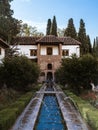 Fountain in the Patio de la Acequia in the Generalife gardens of the Alhambra palace in Granada, Andalusia, Spain Royalty Free Stock Photo