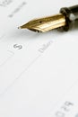 Fountain Pen on Blank Check Royalty Free Stock Photo