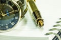 Fountain pen on blank notepad and watch Royalty Free Stock Photo