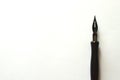 Fountain pen on blank white paper with copy space Royalty Free Stock Photo