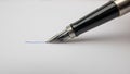 Fountain pen drawing line in blue ink on white paper. Royalty Free Stock Photo