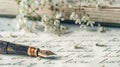 Fountain pen on handwritten letter with white flowers and old books Royalty Free Stock Photo
