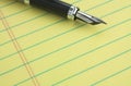Fountain pen on legal pad Royalty Free Stock Photo