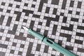 Fountain pen is lying crossword puzzle sheet. Royalty Free Stock Photo