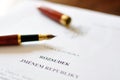 The fountain pen is lying on the paper. Close up. Macro Royalty Free Stock Photo