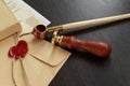 Fountain pen and old notarial wax seal on document, closeup Royalty Free Stock Photo