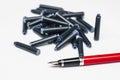 Fountain pen and spare ink cartridges Royalty Free Stock Photo