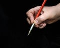 Fountain pen with steel pen in a female hand. Royalty Free Stock Photo