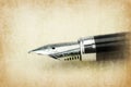 Fountain pen writing on the paper Royalty Free Stock Photo