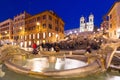 Fountain on the Piazza di Spagna square and the Spanish Steps in Rome at night, Italy Royalty Free Stock Photo