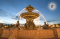 Fountain at the Place de la Concorde in Paris by night (with the moon), France Royalty Free Stock Photo