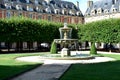 Fountain at Place des Vosges, the oldest square in the city. Paris. France. Royalty Free Stock Photo